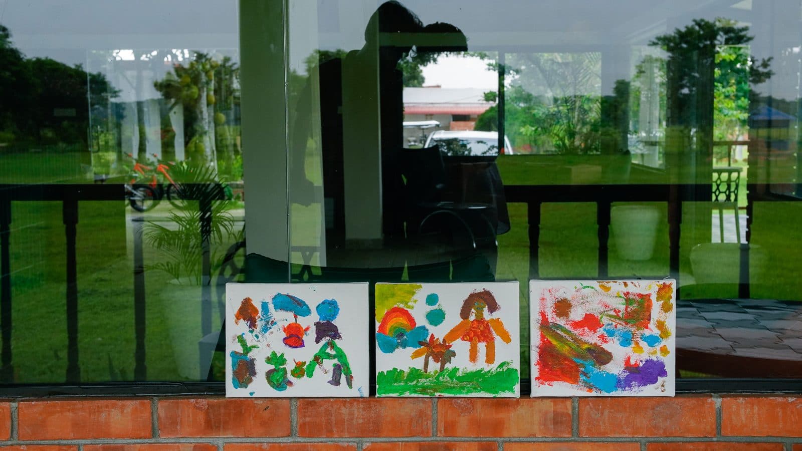 Children's canvas artworks on display