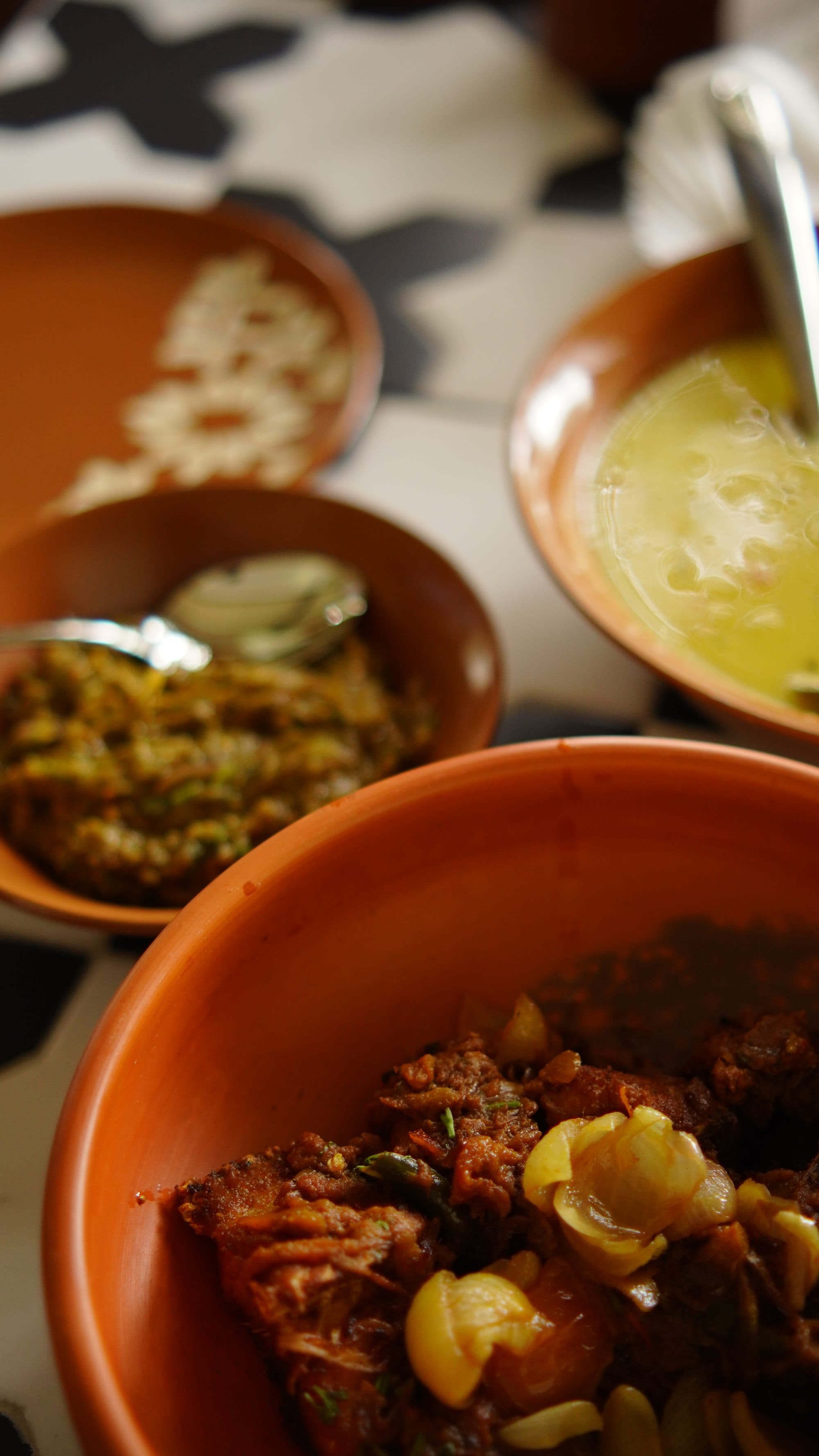 Bowls of bhorta and bhuna
